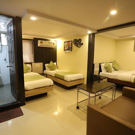 Hotel Happyland Mumbai Zimmer foto