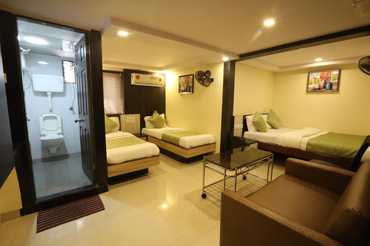 Hotel Happyland Mumbai Zimmer foto