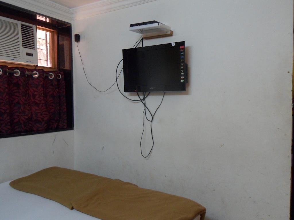 Hotel Happyland Mumbai Zimmer foto